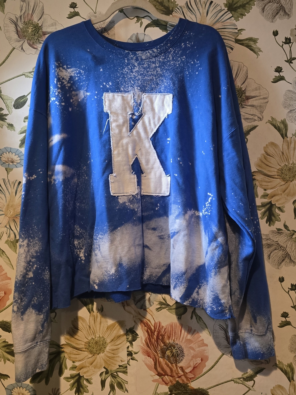 Blue Pullover Sweatshirt with White 'K' Patch